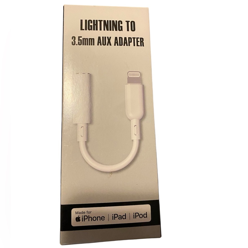 Apple~White Lightning to 3.5mm AUX Adapter
New